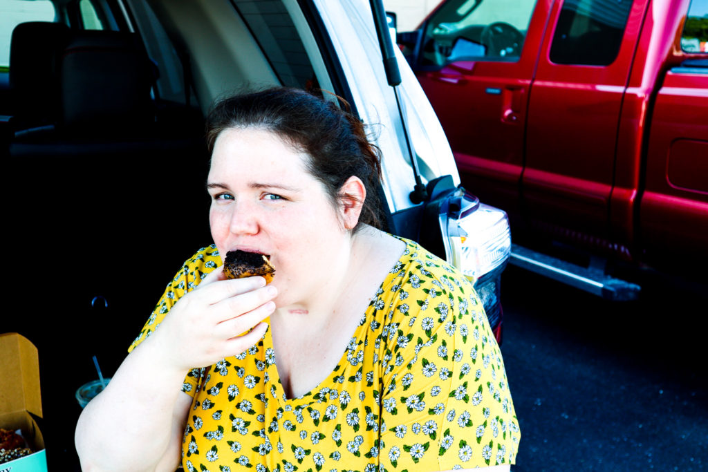 Melissa eating a Sandy Pony Donut in Trunk
